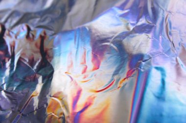 Sanal yanardöner folyo dokusu arka planı. Posterler, kartlar, el ilanları, broşürler, dergiler ve her türlü kapak için kullanılabilir.