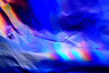 Sanal yanardöner folyo dokusu arka planı. Posterler, kartlar, el ilanları, broşürler, dergiler ve her türlü kapak için kullanılabilir.