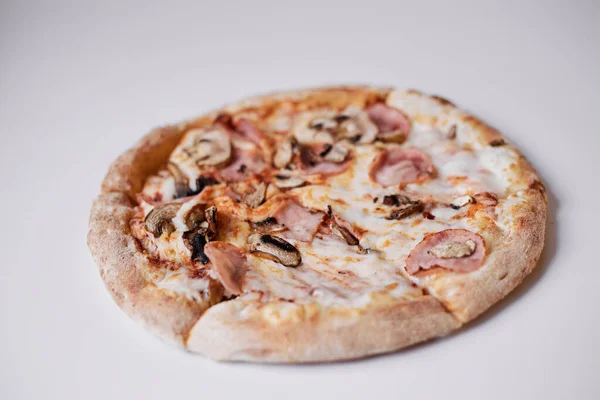 pizza with mushroom and ham isolated, pizza with ham and mushrooms