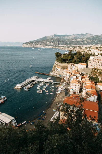 Views of the city of Sorrento in Italy, panorama and top view. Night and day, the streets and the coast. Beautiful landscape and brick roofs. Architecture and monuments of antiquity. Shops and streets with fountains and sculptures.