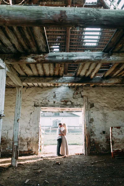 Wedding in European style on the farm. Old abandoned building. Fine art in the style of processing.