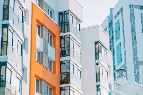 stock image Parts of the facades of modern houses. Bright juicy colors in the construction of buildings.