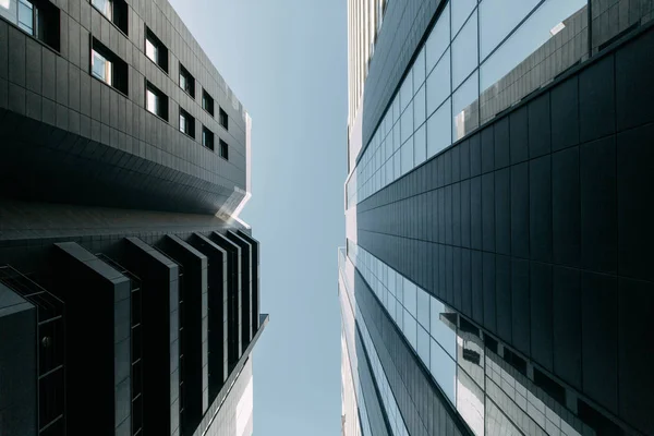 Minimalism in architecture and buildings. The black facade of the house and textures.