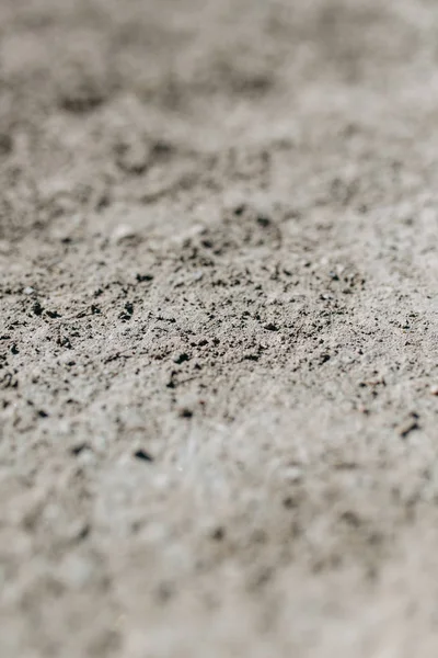  Bulanık arka plan ve bokeh. Bir parlama ile yerde çamur dokusu.