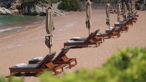 Picturesque Coast Island Sveti Stefan Tourist Beach Sand Sunbeds Montenegro — Stock Video