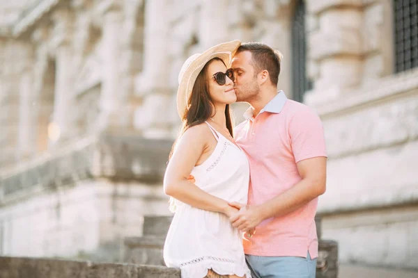 Happy couple at dawn strolling in Italy. Morning summer photo shoot in Rome.