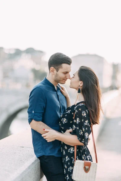 Wedding photography in Italy. Couple walking the streets of Rome, sightseeing and panoramic views.