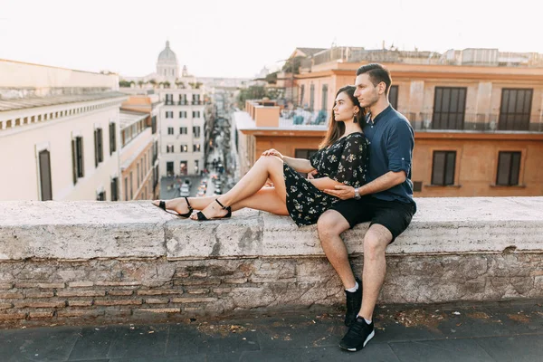 Wedding photography in Italy. Couple walking the streets of Rome, sightseeing and panoramic views.
