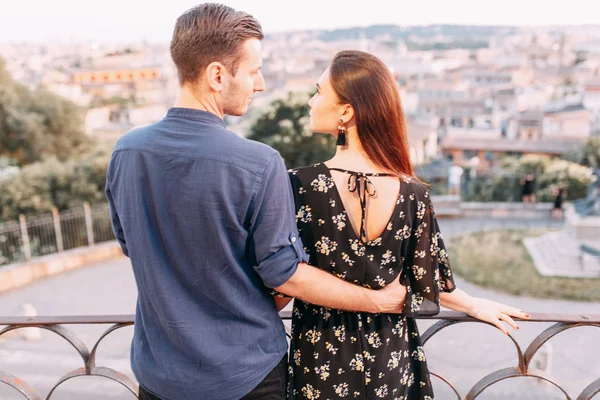 Wedding photography in Italy. Couple walking the streets of Rome, sightseeing and panoramic views.