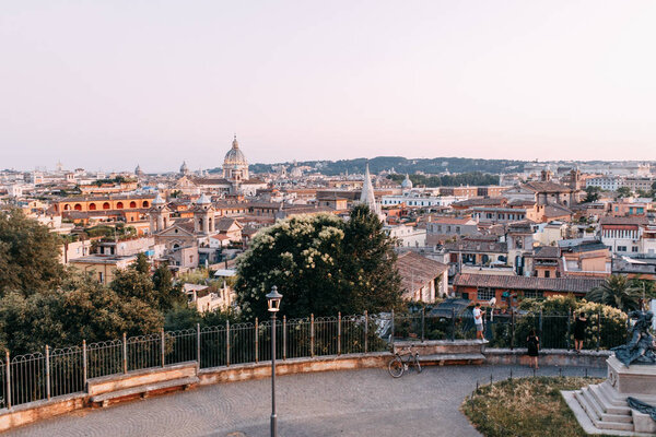 Architecture and panoramas of the old city. Sunset and streets of Rome in Italy. 
