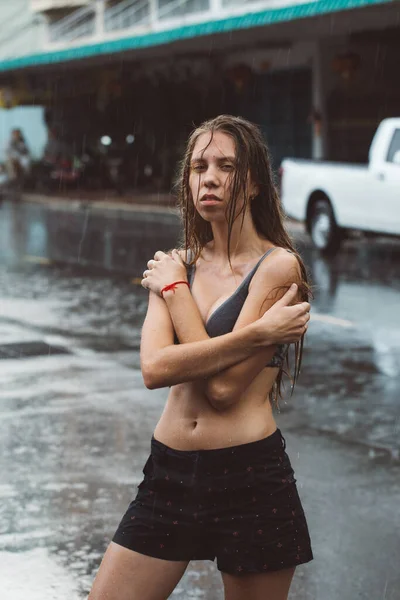 Beautiful girl got wet in the rain