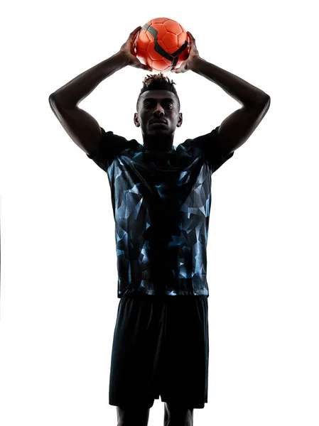 Jeden african soccer player mężczyzna na białym tle silhouet — Zdjęcie stockowe