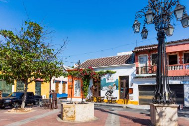 Colorful streets Getsemani Cartagena de los indias Bolivar Colo clipart