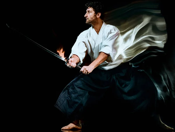 Iaido Kenjutsu bodoka man geïsoleerde zwarte achtergrond — Stockfoto