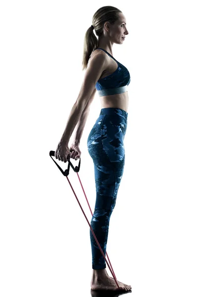 Femme fitness élastique excercise silhouette — Photo