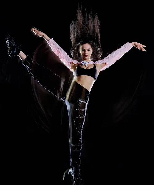 Young woman modern dancer dancing isolated black background light painting — Stock Photo, Image