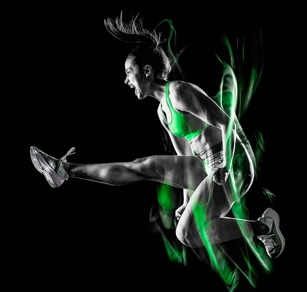女子健身锻炼隔离黑色背景灯光画效果 — 图库照片