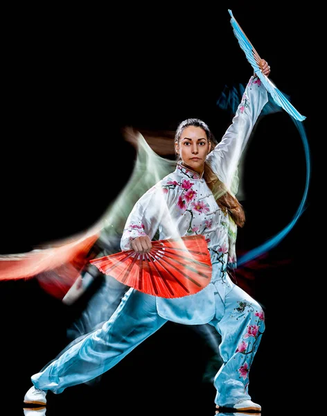 Woman Tai Chi Chuan Tadjiquan posture isolated black background light painting — Stock Photo, Image