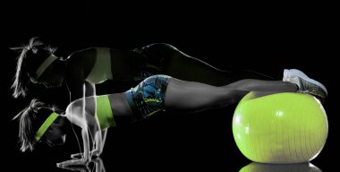 kadın fitness egzersiz izole siyah arka plan lightpainting etkisi egzersizleri