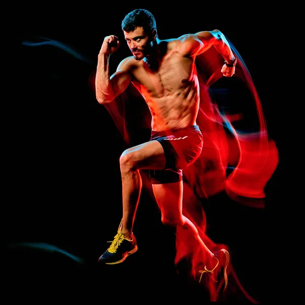 Oben ohne muskulöser Mann Läufer. Jogger joggen isoliert schwarzen Hintergrund — Stockfoto
