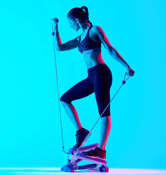 Woman exercsing Stepper fitness exercices isolated — Stock Photo, Image