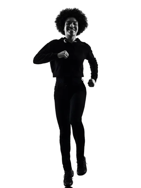 Молодая девушка-подросток бежит улыбающийся силуэт тени изолированы Лицензионные Стоковые Фото