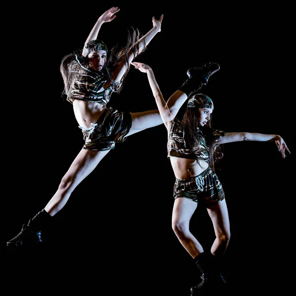 Mladá žena moderní tanečnice taneční izolované černém pozadí světlo malba — Stock fotografie