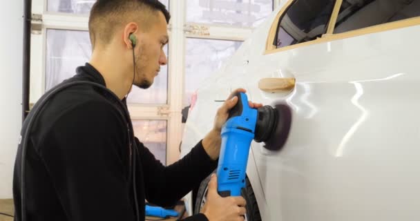 Professional Guy Man Headphones Working Uniform Polishes Car Body Polishing — Stock Video