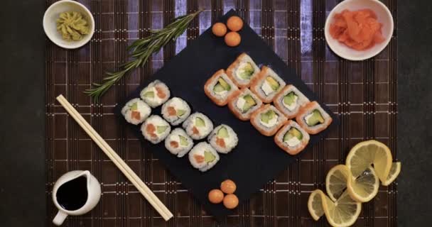 Served Set Sushi Salmon Tuna California Rolls Maki Soy Sauce — Stock Video