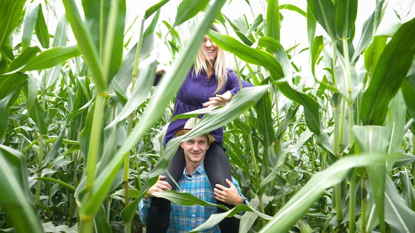 Farmer Carrying Shoulders His Curious Woman While Enjoying Day Nature Royalty Free Stock Photos