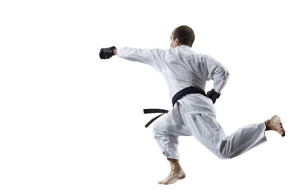 一个黑色的皮带 一个成年运动员用手在跳跃分离的跳动 — 图库照片