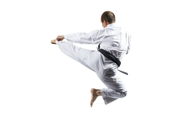 Karategi Sportowiec Bije Kopniaka Skoku Białym Tle Białym Tle — Zdjęcie stockowe