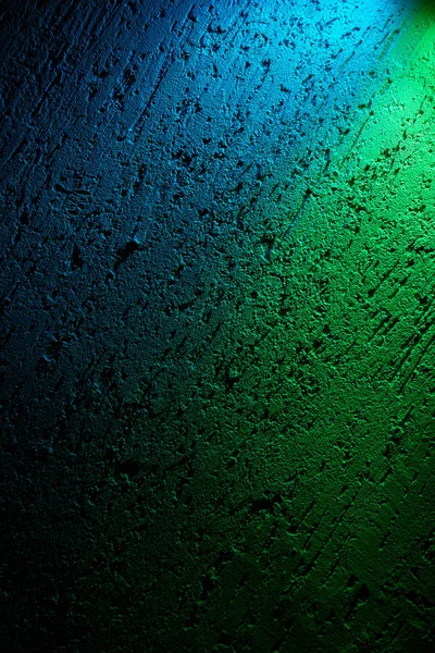 On the textural background, two colors are green and blue with dimming