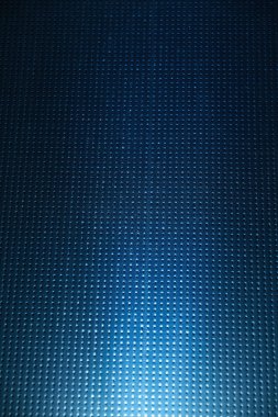 Bir fener ışık mavi Kareli arka plan üzerinde beyaz ışık