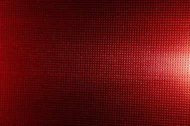 Siyah nokta ve beyaz bir parlaklık ile kırmızı arka plan