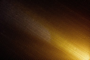 Işık altın rengi bir noktaya karşı dar sarı ışını