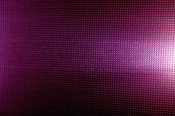 White glow on a purple background in a black dot