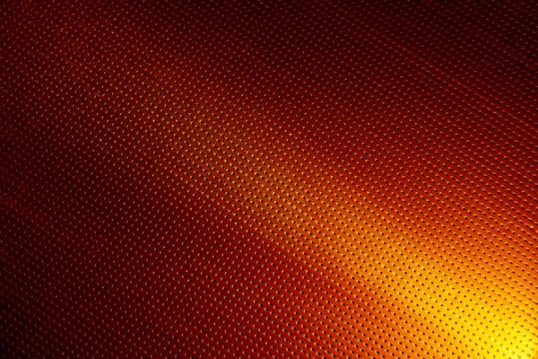 Smalle Gele Lichtstraal Een Oranje Achtergrond Een Zwarte Stip — Stockfoto