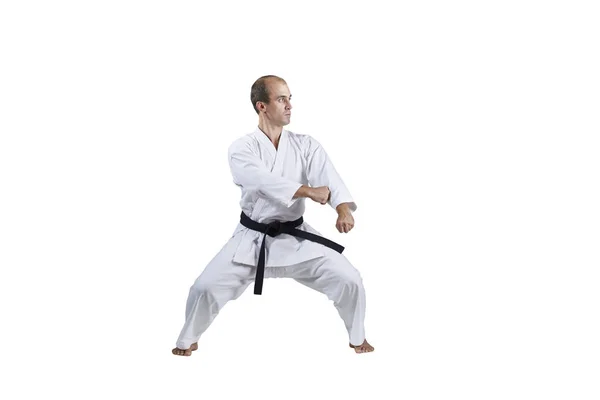 Atleta Activo Adulto Haciendo Ejercicios Formales Karate Sobre Fondo Blanco — Foto de Stock