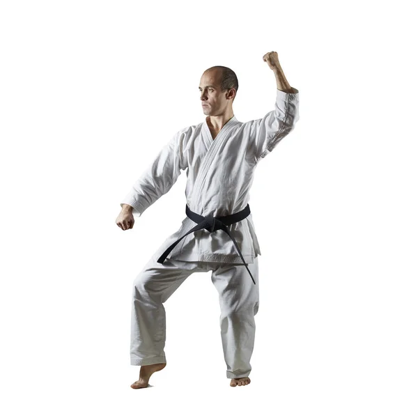 Felnőtt Aktív Sportoló Végez Hivatalos Karate Gyakorlatok Fehér Alapon — Stock Fotó