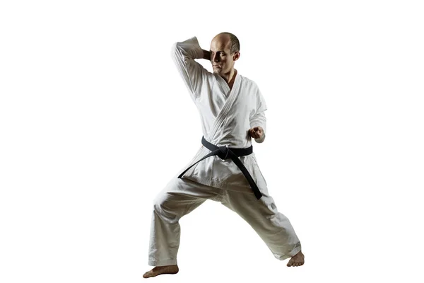 Vit Isolerad Bakgrund Idrottare Gör Formella Karate Övningar — Stockfoto