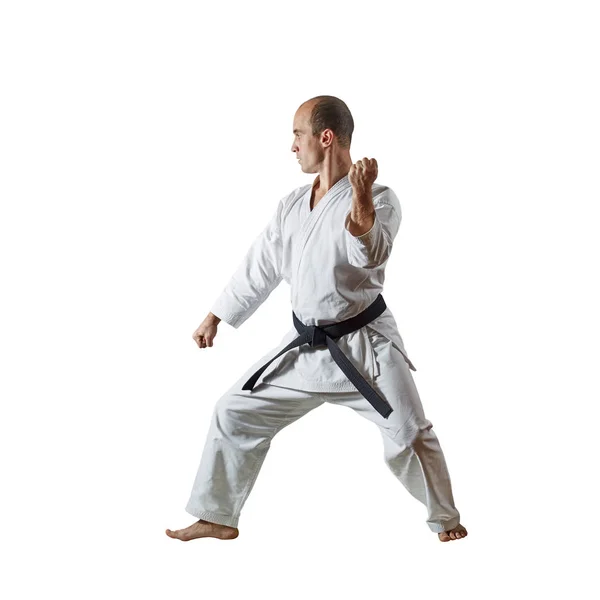 Svart Bälte Atlet Gör Formella Karate Övningar Vit Isolerad Bakgrund — Stockfoto