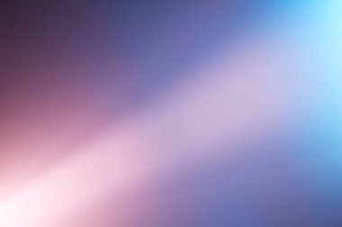 Mavi arka plan üzerinde dağınık aralıklı açık pembe ışık demeti