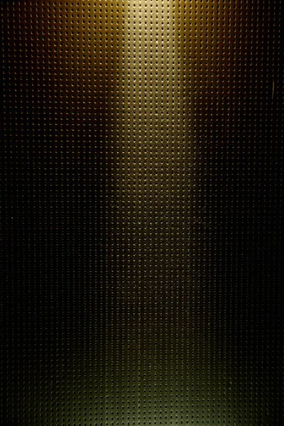 Жёлтый Луч Света Освещается Сверху Тёмно Жёлтым Фоном Точки — стоковое фото