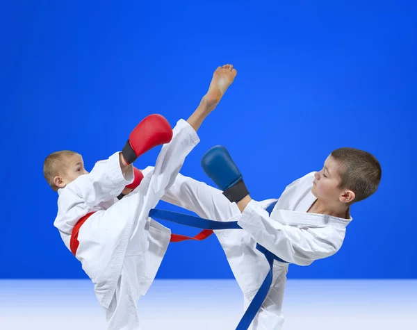 Boys Training Kicks Blue Red Overlays His Hands — Stock Photo, Image