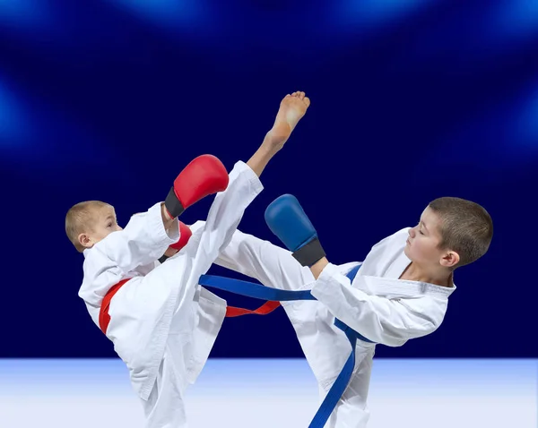 Boys Training Kicks Blue Red Overlays His Hands — Stock Photo, Image