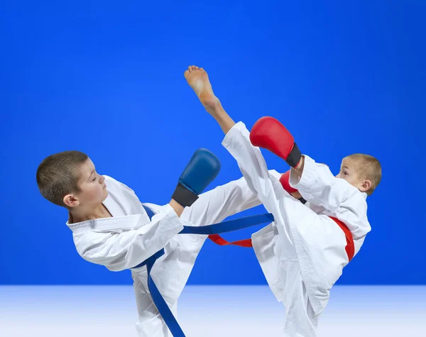 Boys Training Kicks Blue Red Overlays His Hands — Stock Photo, Image