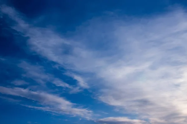 View on beautiful white clouds in a blue sky. Clouds and Skies in the Morning. The Sun behind Clouds. Fresh Air. Cloudy Weather. Cloud Formations. White Clouds