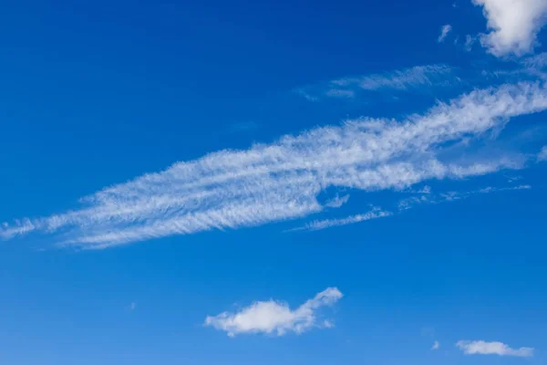 View on beautiful white clouds in a blue sky. Clouds and Skies in the Morning. The Sun behind Clouds. Fresh Air. Cloudy Weather. Cloud Formations. White Clouds