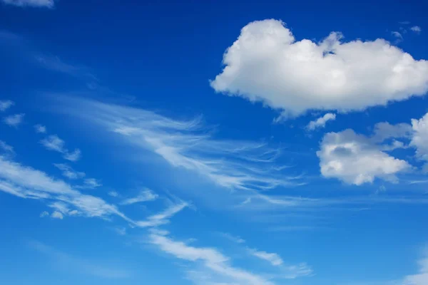 View on beautiful white clouds in a blue sky. Clouds and Skies in the Morning. The Sun behind Clouds. Fresh Air. Cloudy Weather. Cloud Formations. White Clouds